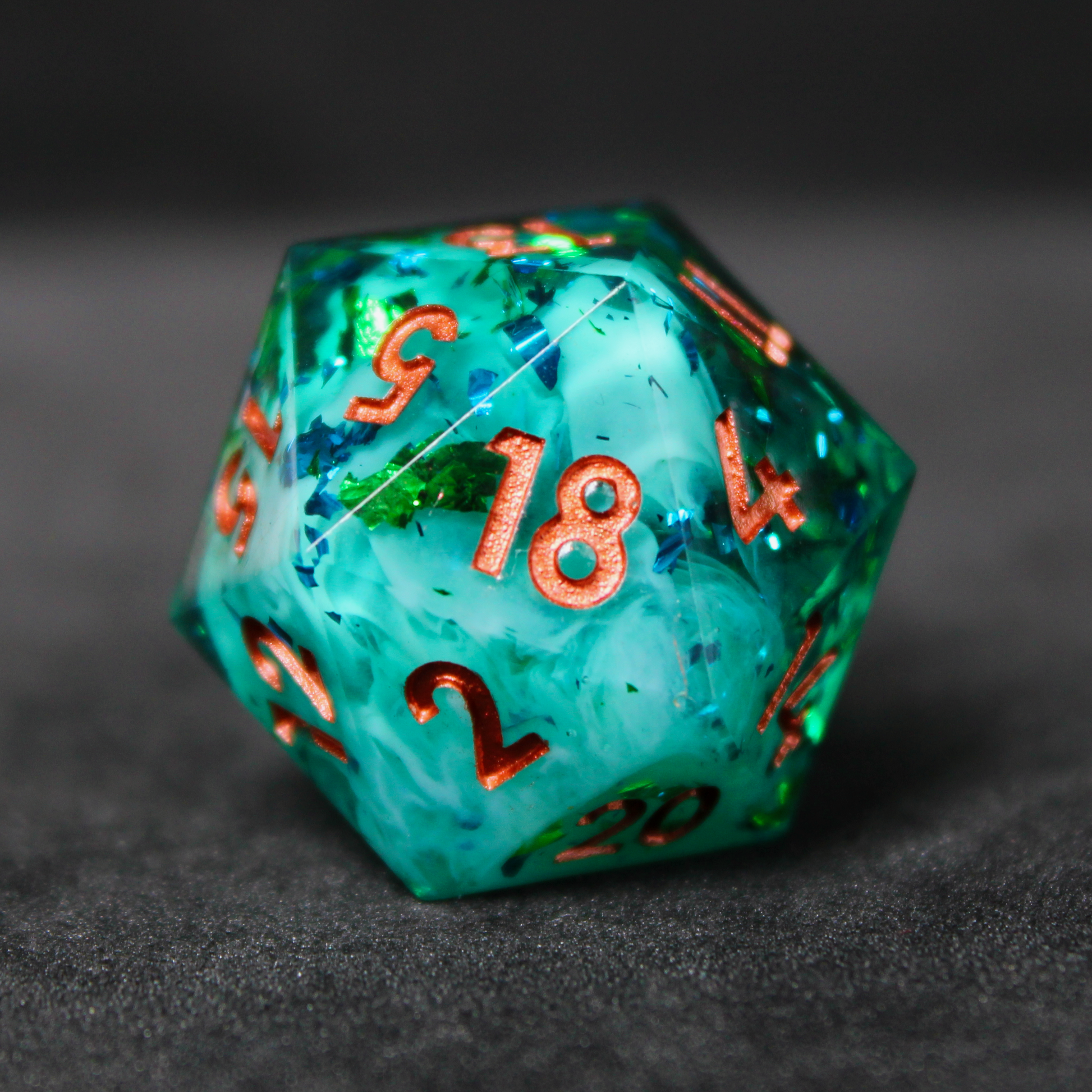 Purple and blue sharp edge dnd dice set. The dice set is used for playing TTRPGs like Dungeons & Dragons / D&D and Pathfinder.