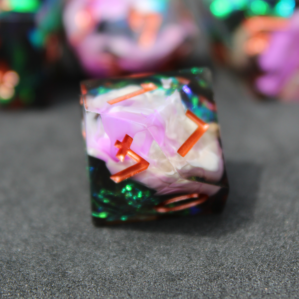 Purple and black resin dnd sharp edge dice. These polyhedral dice are used to play TTRPGs like Dungeons & Dragons / D&D and Pathfinder.
